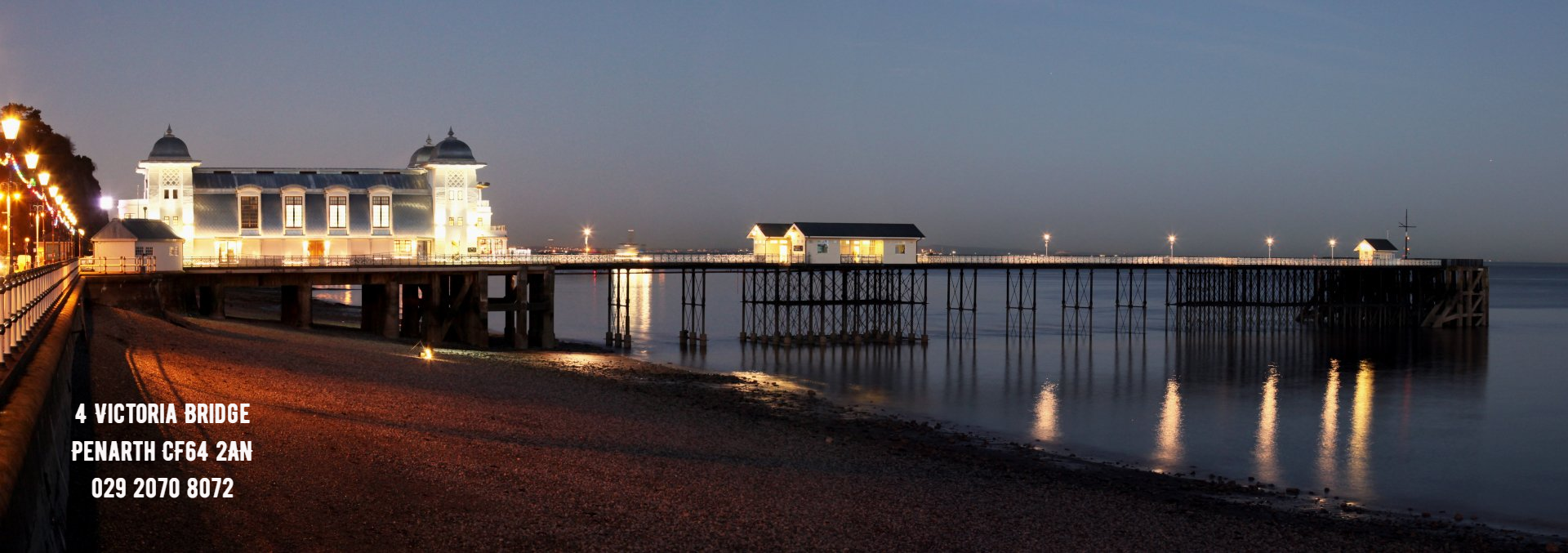 Penarth Pier at night, a panoramic photograph by Vilis Kuksa